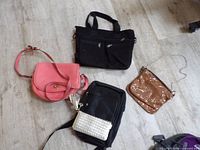 Group shot of all five bags arranged on floor