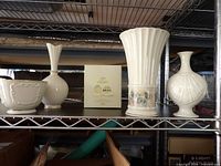 Group shot of all five Lenox pieces on shelf