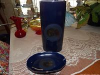 Vase and trinket dish on table showing overall appearance