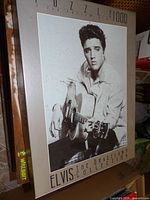 Front of Elvis 1000-piece puzzle box with partial view of Puzz-3D branding on adjacent box