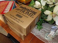 Three boxed sets of Southern Living at HOME SL Gallery Iced Beverage Set of 2, showing packaging and labels