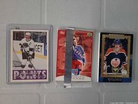 Front view showing Premier card in holder, sealed Post pack, and Upper Deck insert card