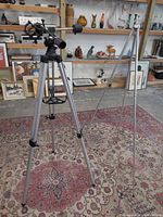 Both tripods side by side displaying height and heads