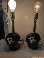 Front view of both helmet lamps with bulbs installed