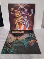 Front covers of both LPs