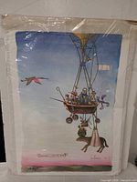 Full view of the protected print showing artwork and size context