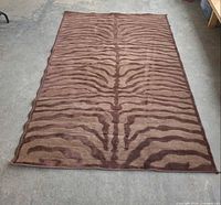 Full view of brown animal-style rug