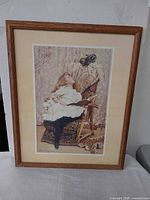 Full view of framed print showing artwork, mat and frame