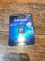 Front view of Lexar Platinum II 32GB SDHC card in blister packaging