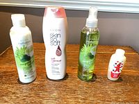 Group shot of four Avon personal care items