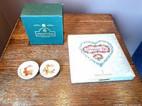 Boxes for Minton cup/saucer and Royal Doulton plate alongside two small dishes