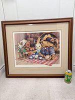 Full view of framed print with scale reference