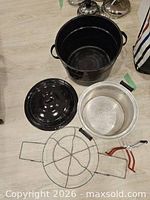 Black speckled enamel canner, lid, aluminum pot, rack, lifter