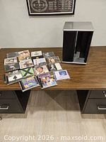Desk view with rotating CD rack and spread of CDs