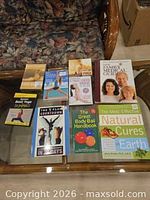 Overview of all eight books and some DVDs on coffee table