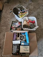 Box with assorted fasteners, two bins of small parts including plunger and funnel