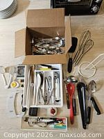 Overhead view of entire assortment including cutlery box, whisks and tray