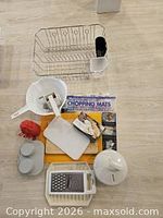 All items laid out including dish rack, boards, chopper and accessories