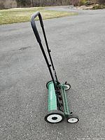 Full view of manual reel lawn mower at angle