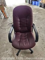 front view of burgundy leather office chair