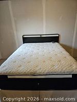 Full view of queen mattress and box spring assembled