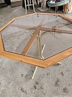 Table assembled showing glass top and base