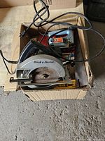 Box showing circular saw, jigsaw and blade packaging