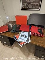 Group shot showing binders, portfolios, file holders, lap desk