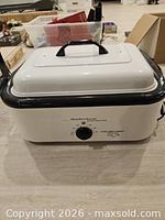 Front view of Hamilton Beach roaster oven with lid in place