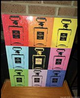 Front view showing full 3×3 grid design of Chanel No.5 bottles