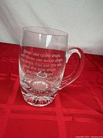 Front view of crystal stein showing full inscription and handle