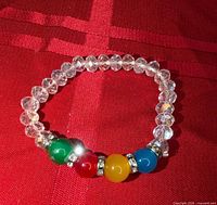 Bracelet showing clear faceted beads and coloured rounds