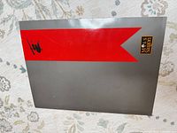 Front cover showing grey and red design with Miss Saigon logo