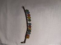 Entire bracelet laid flat showing all letter charms