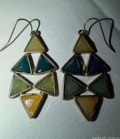 Full view of both earrings showing stone colors and arrangement
