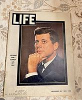 Front cover with JFK portrait and publication details