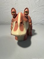 Front view of Jar Jar Binks playset closed