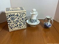 Group shot of boxed Avon pitcher & bowl set with small vase
