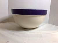 Full view of cream bowl with blue rim