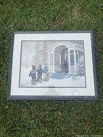 Full view of framed print on grass background