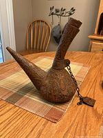 Left side view showing overall form and tooling pattern