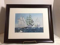 Front view of framed print showing artwork, mat and frame