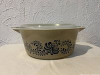 Side profile showing pattern and lid