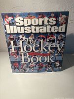 Front cover showing Sports Illustrated title and hockey imagery