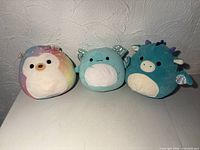 Front view of all three Squishmallows plush