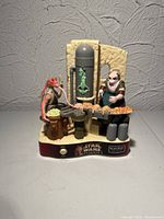 Full view of electronic PEZ dispenser playset showing figures, base and scenery