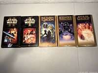 Front view of all five Star Wars VHS boxes
