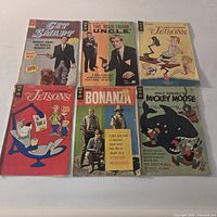 Front covers of all six comic books