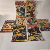 Front covers of all eight comics