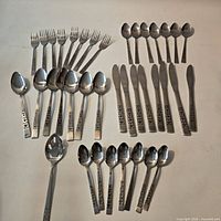 All 36 pieces laid out to show counts and pattern detail